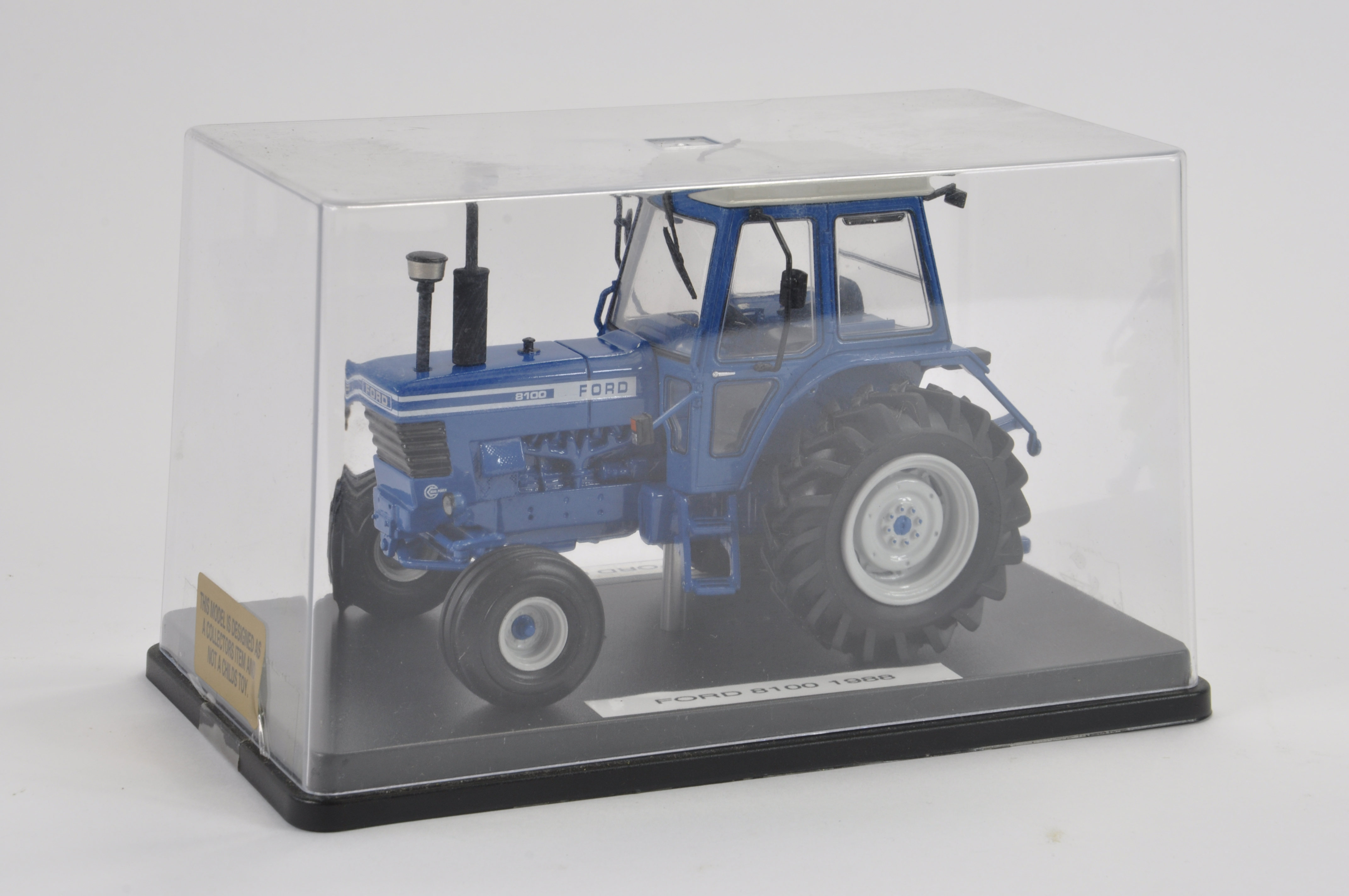 Scarce MFM 1/32 scale Ford 8100 Tractor. NM to M in Display Case.