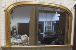 A gilt effect framed rectangular wall mirror,