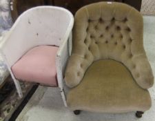 A Victorian tub chair with buttoned back, upholstered in beige velour fabric,