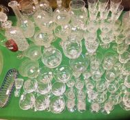 A large collection of glass to include a set of four cut glass and engraved decorated goblets,