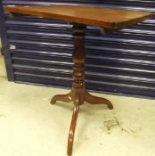 A 19th Century mahogany rectangular tilt top occasional table on baluster turned and ringed