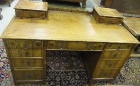 A late Victorian aesthetic oak dressing table with superstructure (missing), two drawers over a