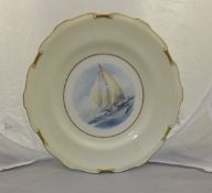 A Royal Crown Derby cabinet plate painted with a sailing vessel by W E J Dean,
