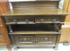 A mid 20th Century oak buffet in the circa 1900 Continental manner,