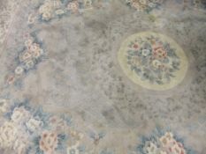 A Chinese superwash carpet, the central circular medallion in cream,