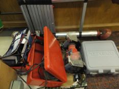 A Parkside bench grinder, a Ferm hand planing machine, an electric engraver,