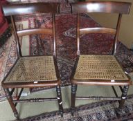 A pair of Victorian mahogany bar back cane seated bedroom chairs