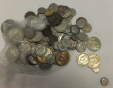 A collection of various British coins to include a quantity of mid 30's / early 40's half crowns,