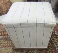 A 19th Century box ottoman upholstered in cream striped fabric,
