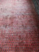 An Arrak carpet, the all-over hook medallions in pale red, blue and cream,