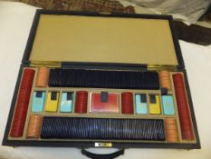 A leather case containing various mid 20th Century plastic gaming chips (5/- to £10),