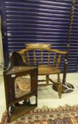 A beech captain's chair, two mahogany wall hanging corner cabinets with mirrored doors,