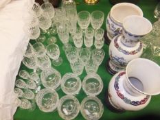 A suite of Waterford glassware to include five hock glasses, six brandy glasses, five wine glasses,