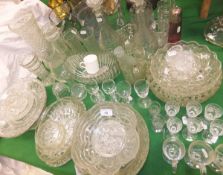 A collection of glassware to include commemorative wares, vases, decanters, fruit bowls,