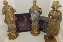 Three carved wooden and gilt and gesso decorated figures in the Italian style,