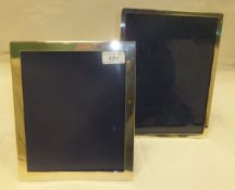 A modern silver photograph frame of plain form, together with a George V silver photograph frame (