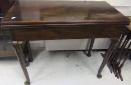 A Victorian mahogany fold over tea table in the 18th Century manner