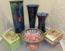 A collection of Maling ware to include two 1931 "Storm" pattern vases, a "Peony rose, rose waved"
