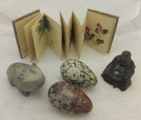 Two painted model eggs, a carved hardstone Buddha, carved hardstone frog and a Chinese floral
