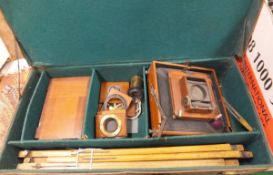 A collection of vintage photographic equipment and a brown leather case to include a "Special