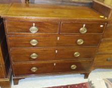 A Victorian mahogany chest of two short and three long drawers with ivory inlaid escutcheons and