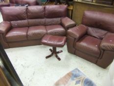 A modern Italian leather upholstered five piece lounge suite, comprising three seat sofa,