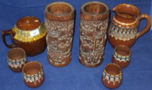 A pair of Chinese carved bamboo brush pots,