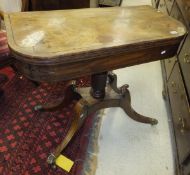 A 19th Century mahogany tea table, the top with inlaid fleur de lys style decoration, raised on a