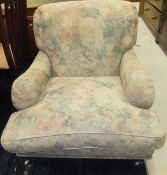A Derwent floral upholstered armchair in the Howard manner,