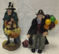 A Royal Doulton figure "The Mask Seller", model HN2103,