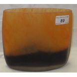 A Taru Syrjanen glass vase decorated in orange and black