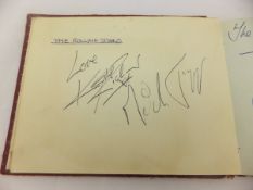 An autograph album containing signatures of Brian Jones, Keith Richards and Mick Jagger of The