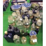 A collection of apothecary jars to include two blue glazed pottery jars with lids, one bearing label