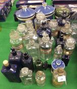 A collection of apothecary jars to include two blue glazed pottery jars with lids, one bearing label