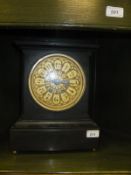 A 19th Century French black slate cased mantel clock, the eight day movement but Vincenti & Cie,