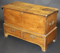A 19th Century pine mule chest with rising lid over two drawers, on bracket feet CONDITION REPORTS