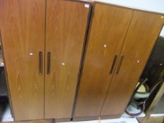 A pair of G Plan teak two door wardrobes and two Victorian balloon back dining chairs