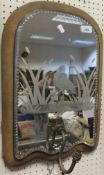 A pair of girandole mirrors with wading bird amongst reeds etched into the glass and a single branch