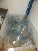 A box of assorted Pyrex dishes,