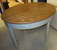 A pair of pine and painted D shaped table ends on turned supports