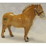 A Beswick pottery figure of a Norwegian forge horse CONDITION REPORTS Has general wear and tear