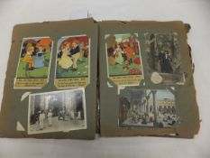 An album containing Victorian postcards and greetings cards CONDITION REPORTS The album is falling
