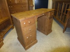 A pine chest of two short and four long drawers on turned feet,