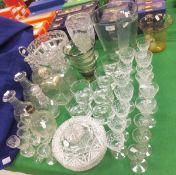 A collection of glassware to include various 19th Century and later cut glass decanters,