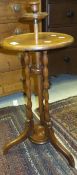 A Victorian mahogany adjustable candle table on tripod base,