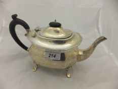 A silver teapot with ebonised handle (Birmingham,