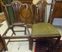 A pair of 19th Century oak framed dining chairs in the Chippendale style,