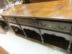 A modern oak dresser in the 18th Century manner,