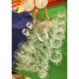 A collection of glassware to include a set of six cut glass hock glasses,