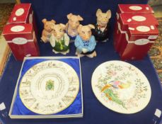 A collection of five Nat West piggy banks to include Wade,